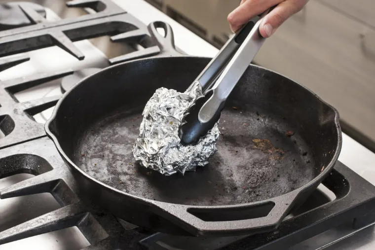 clean pots and pans aluminum foil