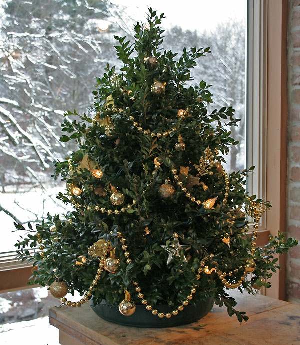 arbre-de-Noël-guirlandes-collier-brillant