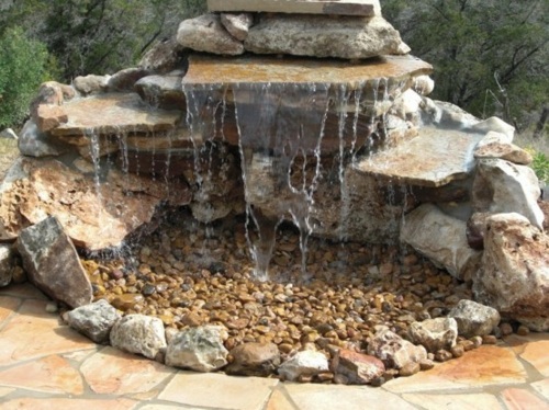bassin de jardin pierre caillou cascade eau
