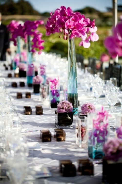 beaux vases en flute fleurs rose fuschia