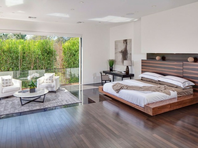 chambres coucher moderne lit double plateforme sureleve baie lounge exterieur