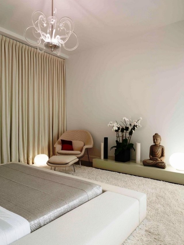 chambre zen chambre-zen-idées-atmosphère-chambre-coucher-tapis-blanc-statue-boudhha