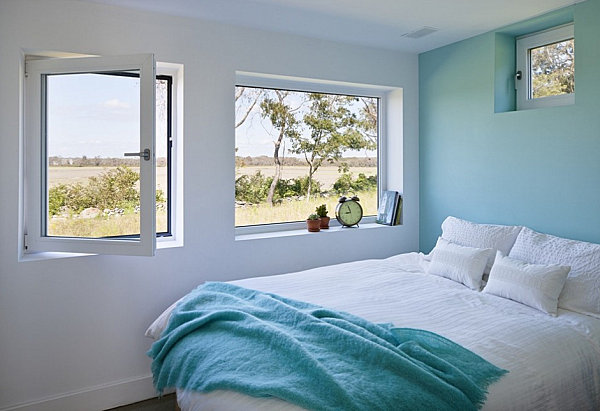 chambre adulte avec couleurs relaxantes bleu clair frais