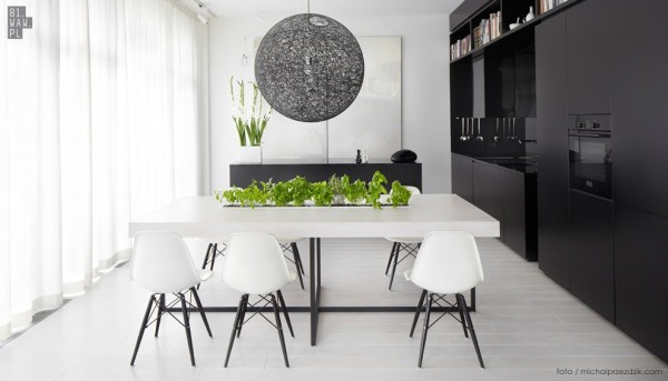 sentir style moderne avec le blanc et le noir et les lignes droites salle manger cuisine