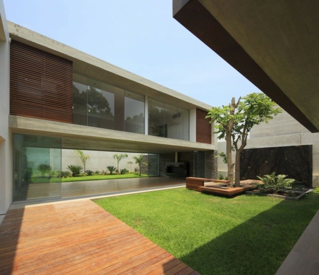 design maison moderne jardin véranda
