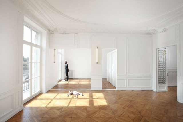 Appartement archi Paris avec son salon spacieux en style classique