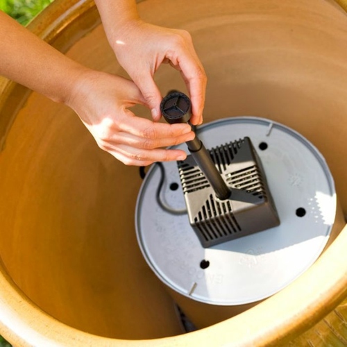 fontaine pompe eau pot cache installation mecanisme
