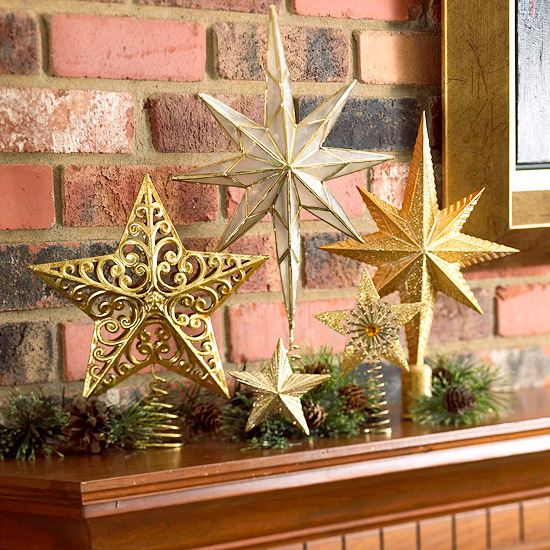 idée-décoration-Noël-cheminée-étoiles-dorées