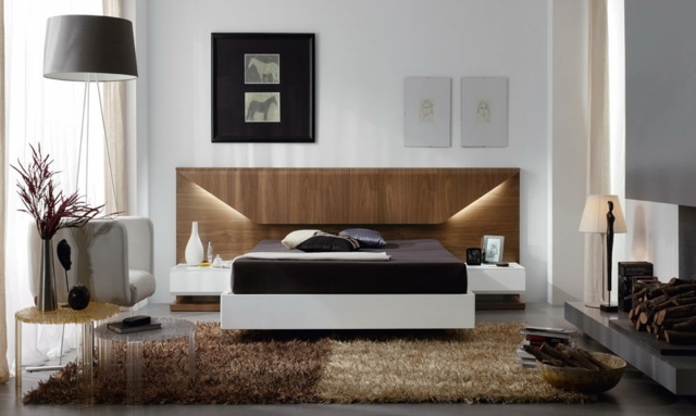 idées-déco-chambre-coucher-couleurs-naturelles-murs-blancs-lampe-poser-élégante-tapis-beige-marron-tête-lit-bois idées déco chambre à coucher