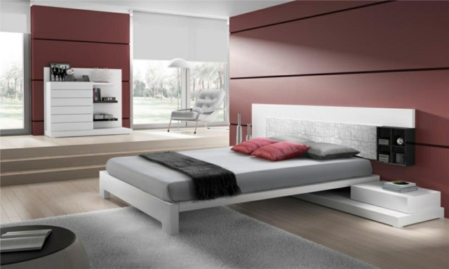 idées-déco-chambre-coucher-couleurs-naturelles-murs-rouge-tapis-linge-lit-gris-clair idées déco chambre à coucher