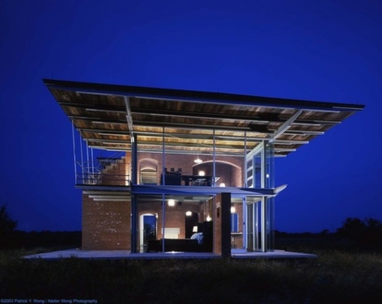 maison moderne brique acier verre nuit