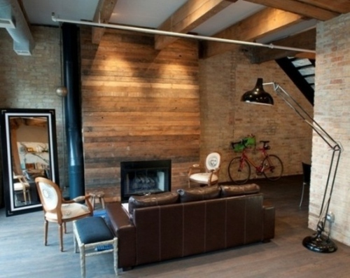 mur bois canapé brun cheminee salon masculin
