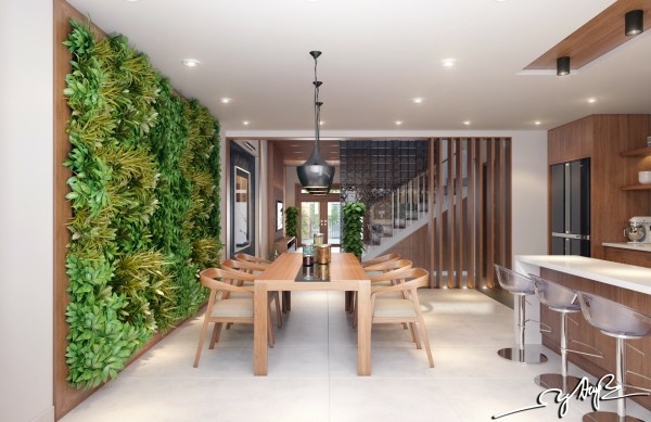 Table en bois salle à manger mur végétal intérieur