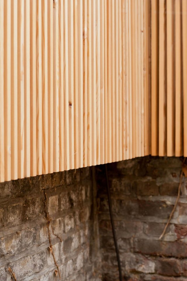 muret existant briques extension bois clôture garantit intimité