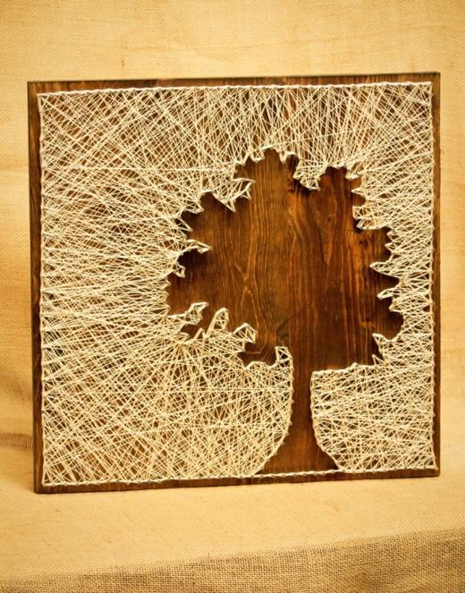 oeuvre intéressante ficelles tracent contour arbre sur bois