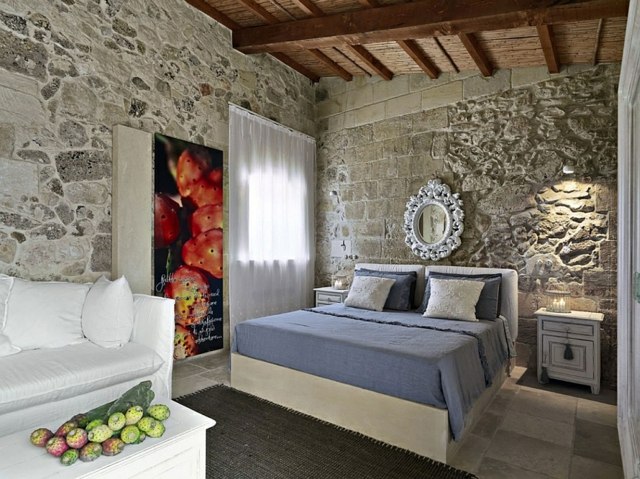 rustique ambiance hotel italie chambre lit lumiere pierre fruits