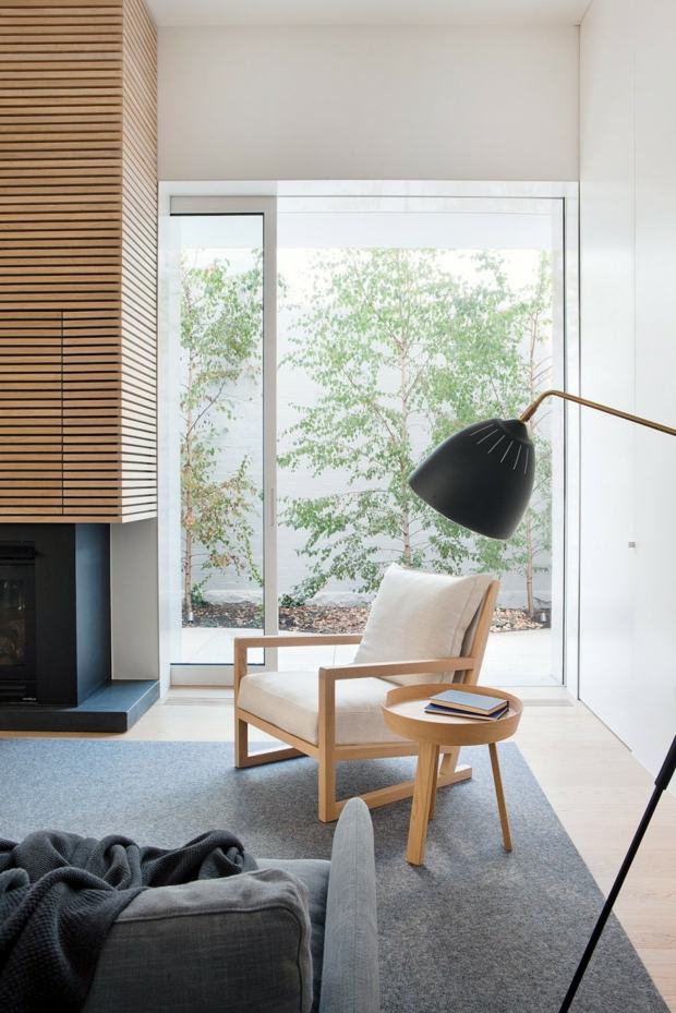 salle de séjour minimaliste avec coin lecture cheminée design
