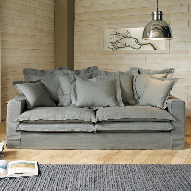 tapis-gris-salon-canapé-gris-coussins-suspension-métallique-tapis-tricoté