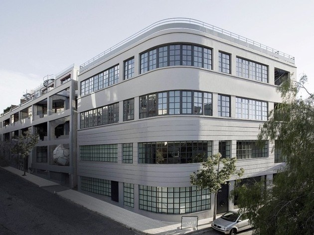 usine reconvertie bâtiment résidentiel façades vitrées
