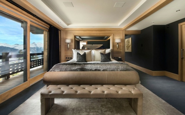 Chambre extraordinaire avec terrasse et vue vers les pistes grand lit royal chalet