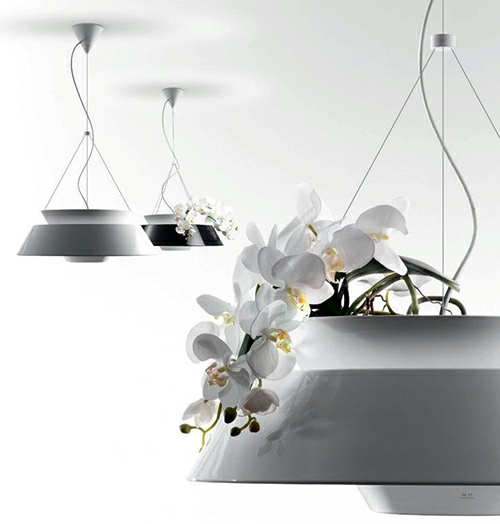 éclairage intérieur versatile combine pot de fleur et lampe